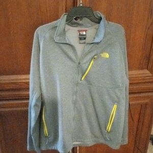 The North Face Men's Gray Jacket with Yellow Zippers